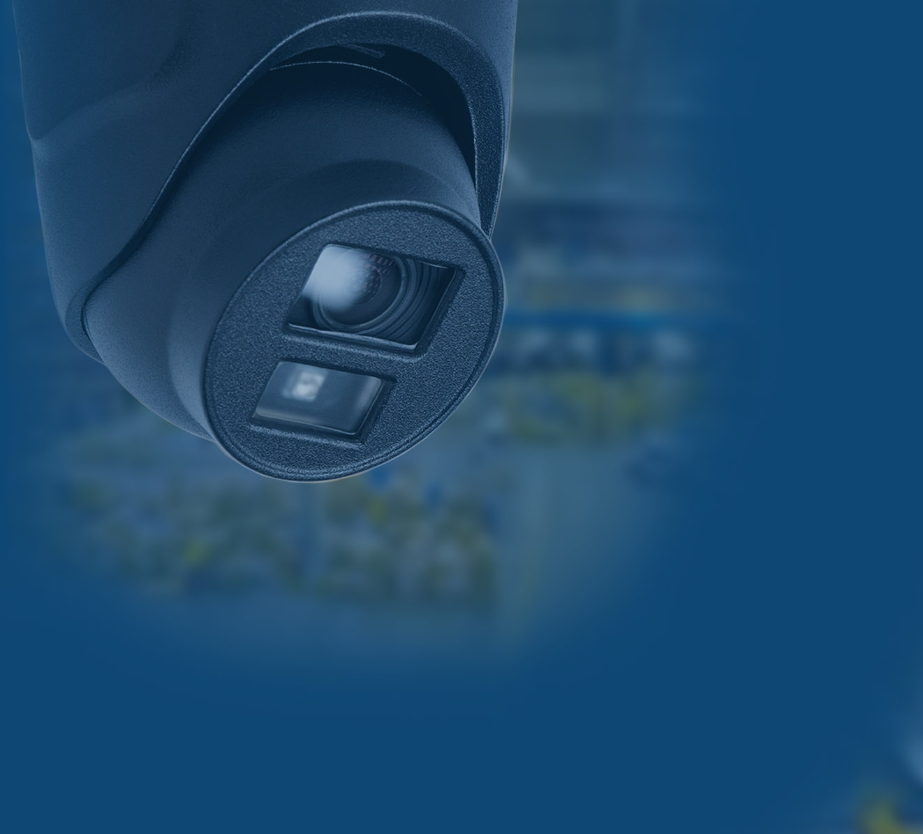 A CCTV camera on a dark blue background
