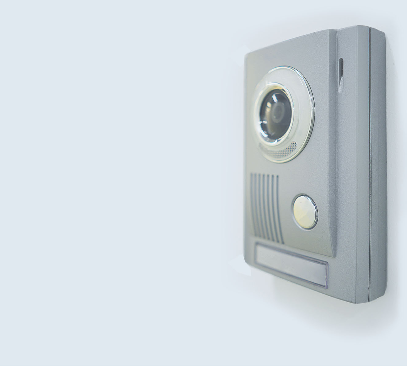 A video intercom against a gray background